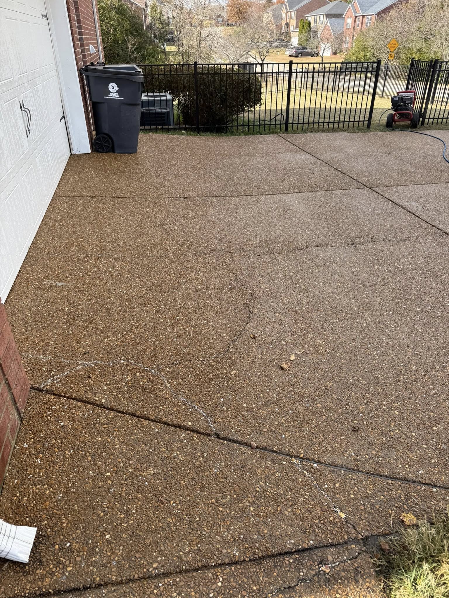 After professional pressure washing - restored driveway Wilson County